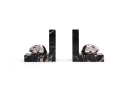OTTENWALD, A PAIR OF ART DECO SILVERED BRONZE AND MARBLE RABBIT BOOKENDS