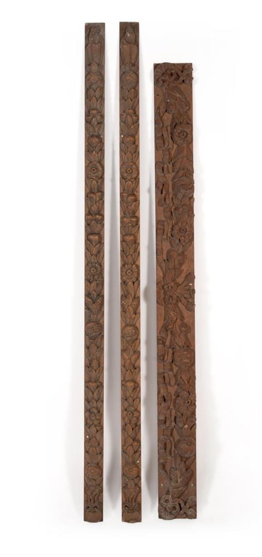 A SET OF THREE CARVED OAK PANELS OR WALL MOUNTS, 17TH CENTURY