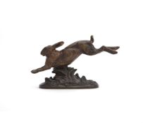 JULES-EDMOND MASSON (FRENCH, 1871-1932)), A BRONZE MODEL OF A RUNNING HARE