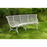 A HAND-FORGED WHITE PAINTED GARDEN OR ARRAS SEMI-CIRCULAR BENCH, MODERN