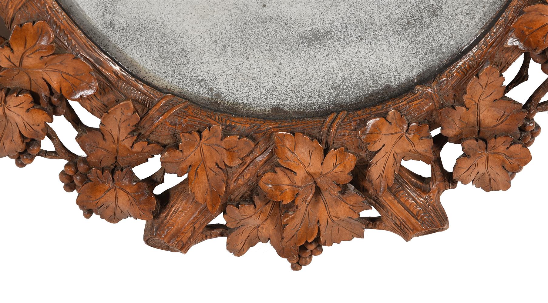 A GERMAN 'BLACK FOREST' CARVED SOFTWOOD OVAL MIRROR, LATE 19TH CENTURY - Image 2 of 5