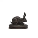 ANTOINE-LOUIS BARYE (FRENCH, 1795-1875), A BRONZE MODEL OF A CROUCHING RABBIT