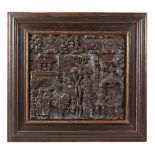 AN ELIZABETHAN CARVED OAK PANEL 'THE PRODIGAL SON' LATE 16TH CENTURY Panel 57 by 64cm Later frame