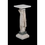 AN ANCIENT ROMAN MARBLE FRAGMENT MADE INTO A PEDESTAL, ANTIQUE AND LATER