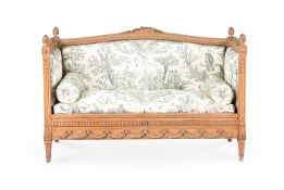 A FRENCH CARVED BEECH AND UPHOLSTERED SOFA, IN LOUIS XVI STYLE, LATE 19TH CENTURY
