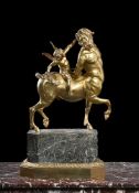 AFTER THE ANTIQUE, A LARGE 'GRAND TOUR' GILT BRONZE OF THE FURIETTI CENTAUR, EARLY 19TH CENTURY