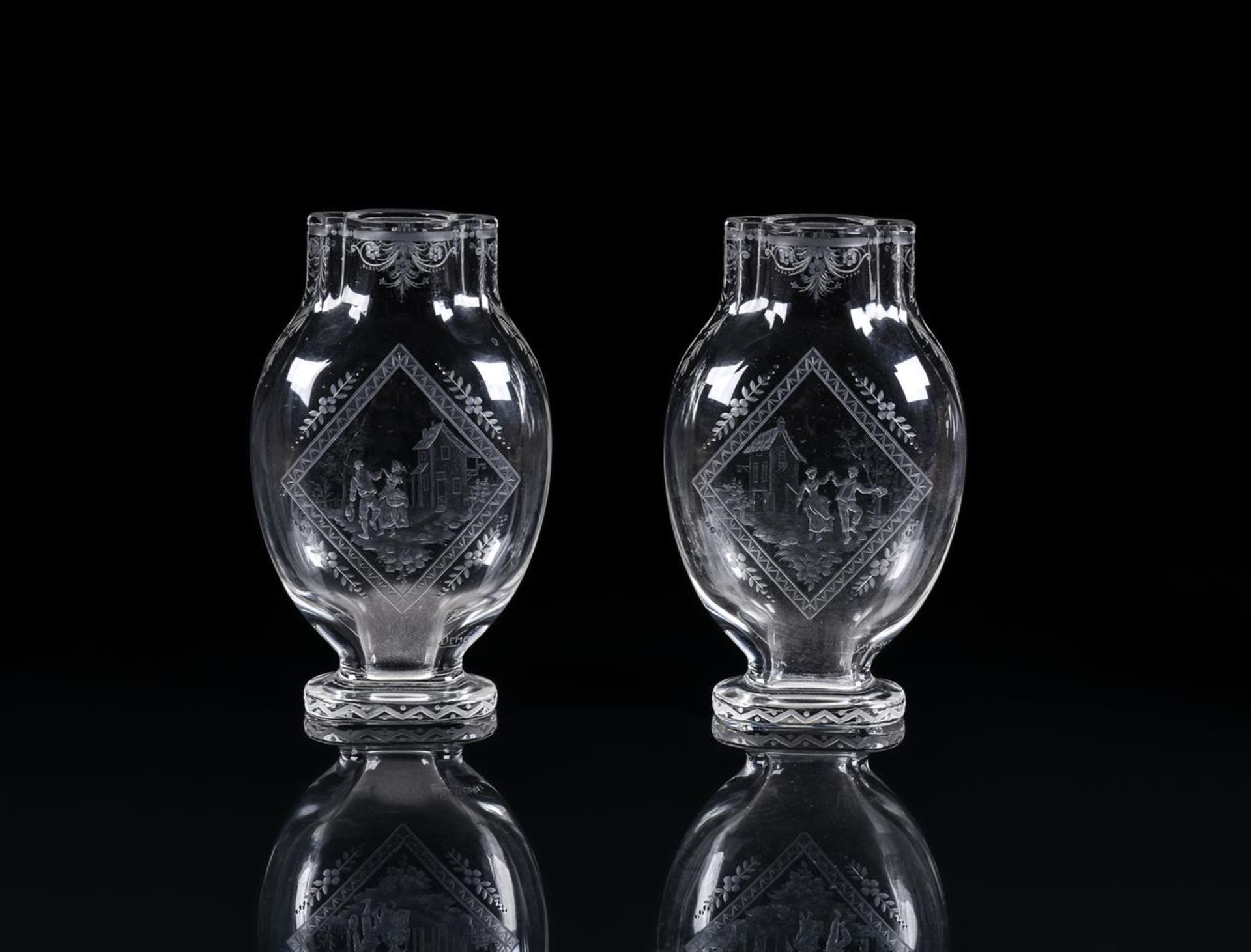 A PAIR OF ROCK-CRYSTAL GLASS VASES MADE FOR THE PARIS RETAILER GEORGES ROUARD