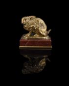 ANTOINE-LOUIS BARYE (FRENCH, 1795-1875), A GILT BRONZE MODEL OF A CROUCHING RABBIT