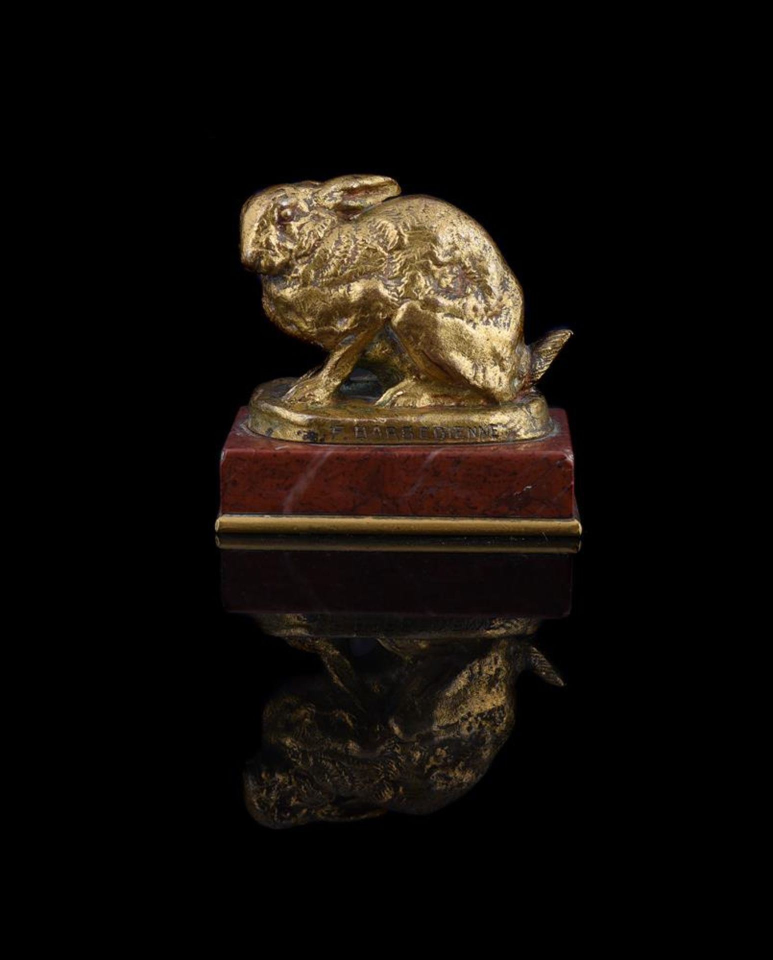 ANTOINE-LOUIS BARYE (FRENCH, 1795-1875), A GILT BRONZE MODEL OF A CROUCHING RABBIT