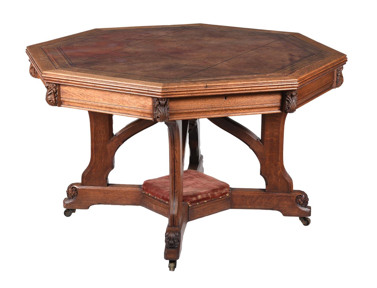 A VICTORIAN REFORMED GOTHIC CARVED OAK LIBRARY TABLE, CIRCA 1880