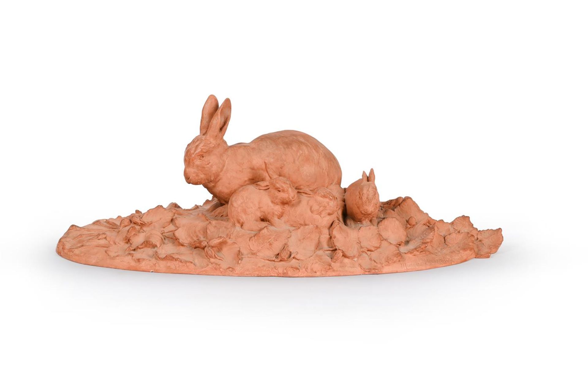 λ MARGUERITE MONOT (FRENCH, 1903-1961), A LARGE TERRACOTTA GROUP OF RABBIT WITH KITS