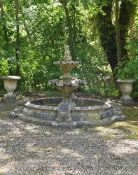A LARGE STONE COMPOSITION FOUNTAIN WITH SURROUND, IN 19TH CENTURY STYLE, 20TH CENTURY
