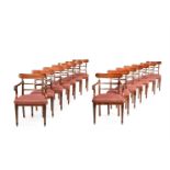 AN UNUSUAL SET OF FOURTEEN GEORGE IV MAHOGANY AND BRASS INLAID DINING CHAIRS, CIRCA 1825