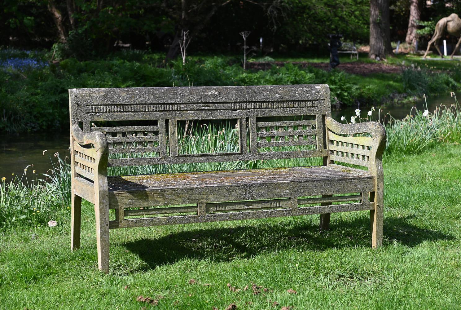 AN UNUSUAL TEAK GARDEN BENCH, 20TH CENTURY