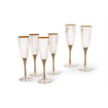 A SET OF SIX SILVER CHAMPAGNE FLUTES