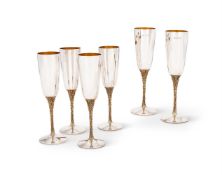 A SET OF SIX SILVER CHAMPAGNE FLUTES
