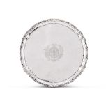 A GEORGE III SILVER SHAPED CIRCULAR SALVER