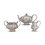 Y A VICTORIAN SILVER LOBED BALUSTER THREE PIECE TEA SET