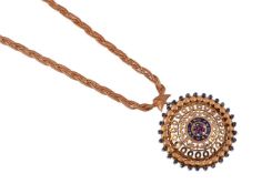 UNO-A-ERRE, A GOLD COLOURED WOVEN LINK CHAIN WITH AN ASSOCIATED SAPPHIRE AND RUBY PENDANT