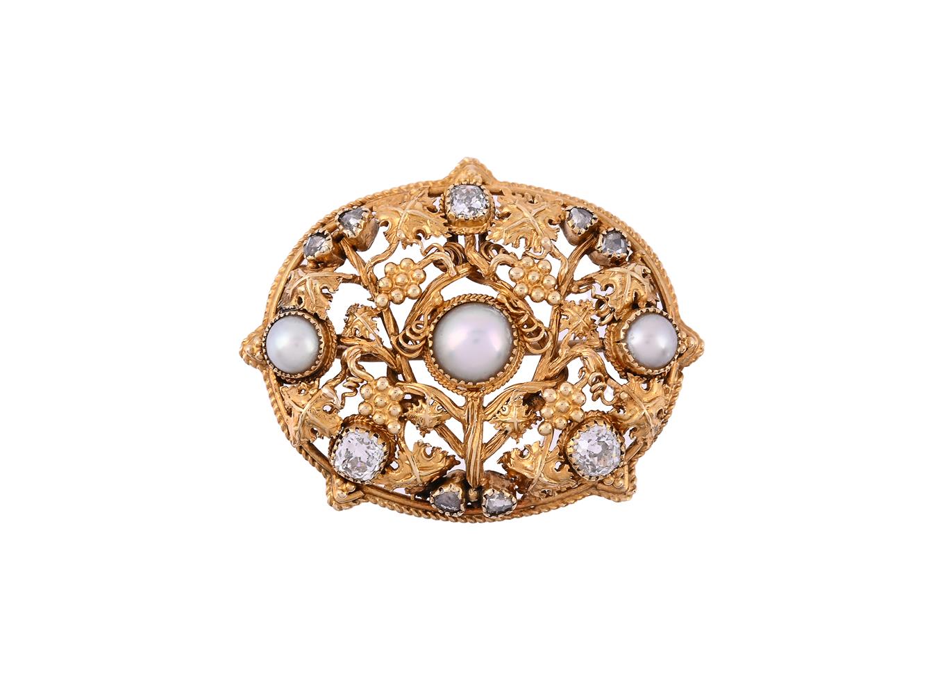 AN EARLY 20TH CENTURY ARTS AND CRAFTS DIAMOND AND HALF PEARL BROOCH