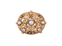 AN EARLY 20TH CENTURY ARTS AND CRAFTS DIAMOND AND HALF PEARL BROOCH