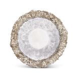 A LARGE GEORGE IV SILVER SHAPED CIRCULAR SALVER