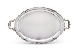 A SILVER SHAPED OVAL TWIN HANDLED TRAY