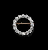 TIFFANY & CO., A MID 20TH CENTURY DIAMOND CIRCLET BROOCH