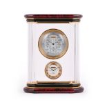 A RED MARBLE, CRYSTAL AND GILT METAL WORLD TIME CLOCK