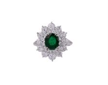 A FRENCH DIAMOND AND EMERALD RING, POSSIBLY CIVANYAN