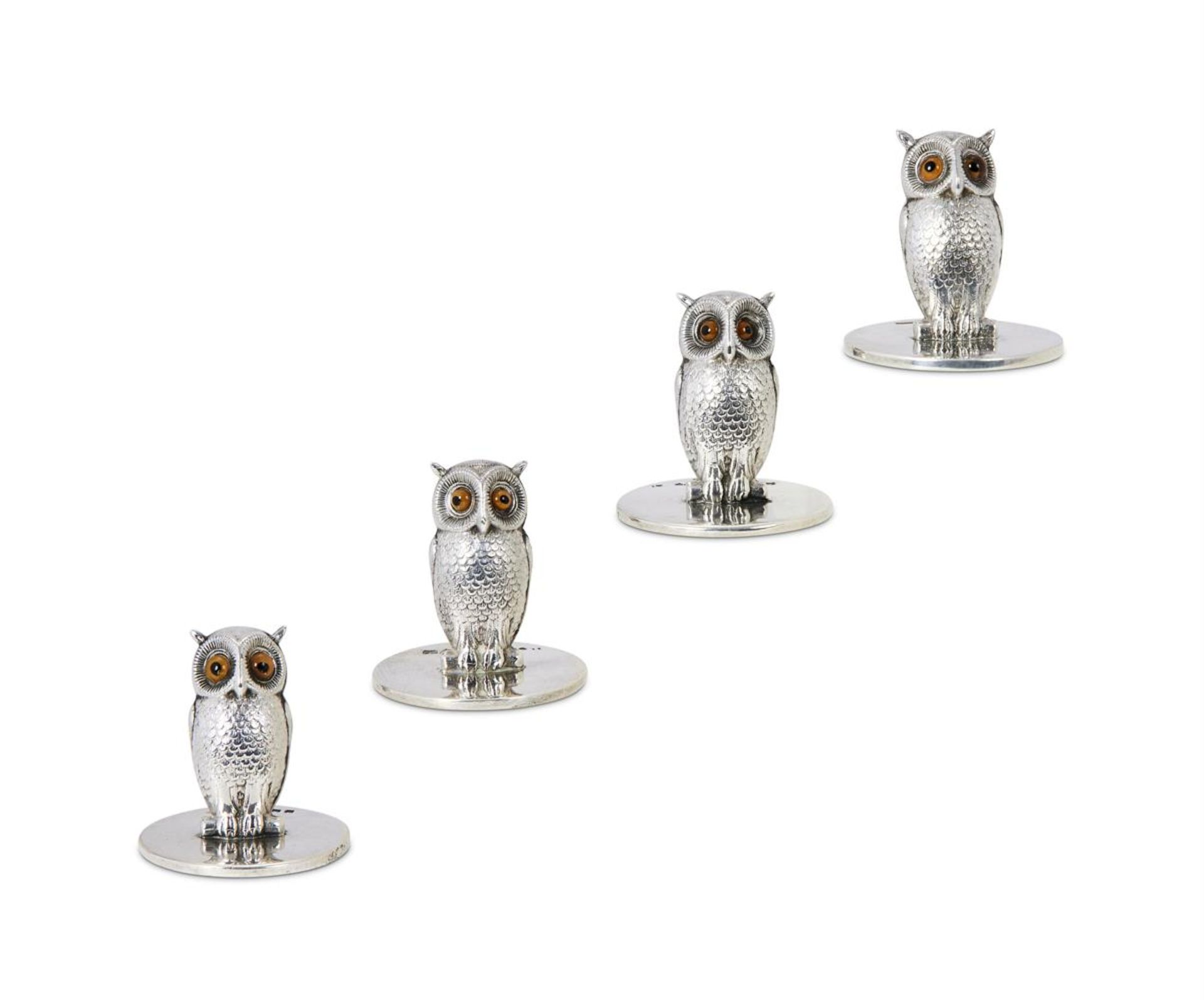 A MATCHED SET OF FOUR SILVER OWL MENU HOLDERS