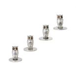 A MATCHED SET OF FOUR SILVER OWL MENU HOLDERS