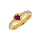 CARTIER, A RUBY AND THREE COLOUR RING, CIRCA 1995