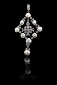 A NATURAL PEARL AND DIAMOND PENDANT