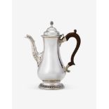 A SILVER BALUSTER COFFEE POT