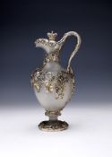 A VICTORIAN SILVER MOUNTED AND FROSTED GLASS CLARET JUG
