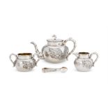 Y A CASED CHINESE SILVER FOUR PIECE CIRCULAR TEA SET