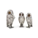 A SILVER THREE PIECE OWL CRUET SET