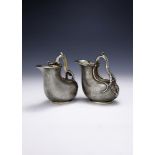 A MATCHED PAIR OF VICTORIAN SILVER ASKOS JUGS