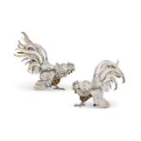 A PAIR OF GERMAN SILVER AND SILVER GILT FIGURES OF COCKERELS