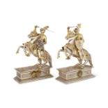 A PAIR OF SILVER AND SILVER GILT MODELS OF KNIGHTS ON HORSEBACK