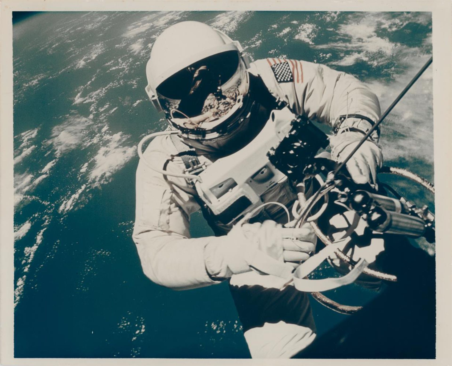 The first view of a human in space, taken during the first U.S. spacewalk, Gemini 4, 3 June 1965