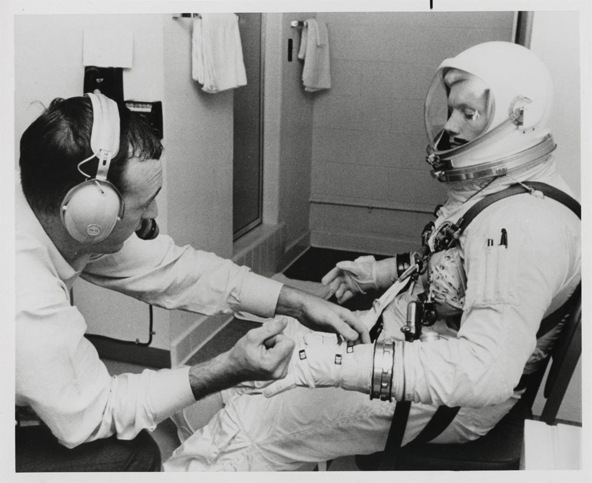 Neil Armstrong & Dave Scott preparing for the first docking in space (2 views), Gemini 8 - Image 2 of 5