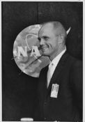 Portrait of John Glenn alongside the NASA insignia (large format), Mercury Atlas 6, February 1962