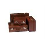 Y A COLLECTION OF FOUR 'CROCODILE' LEATHER TRAVELLING CASES