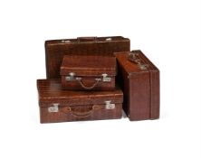 Y A COLLECTION OF FOUR 'CROCODILE' LEATHER TRAVELLING CASES