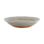 λ RICHARD BATTERHAM (BRITISH 1936-2021), A GREEN ASH GLAZED STONEWARE BOWL