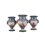 A GARNITURE OF THREE ENGLISH PEARLWARE TWO-HANDLED URNS PAINTED WITH BIRDS AND FRUIT