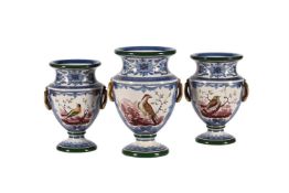 A GARNITURE OF THREE ENGLISH PEARLWARE TWO-HANDLED URNS PAINTED WITH BIRDS AND FRUIT