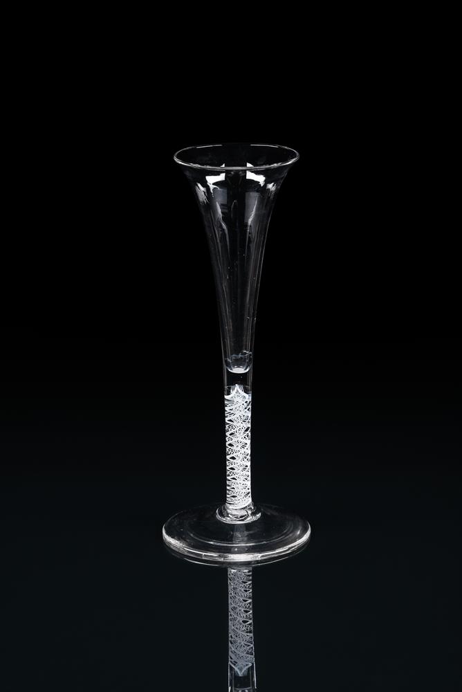 AN OPAQUE-TWIST TOASTING GLASS